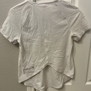 Lululemon dri fit white top, size 2, no tag, worn once.